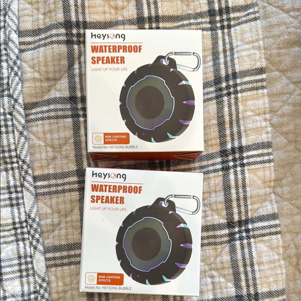 Two brand new waterproof speakers